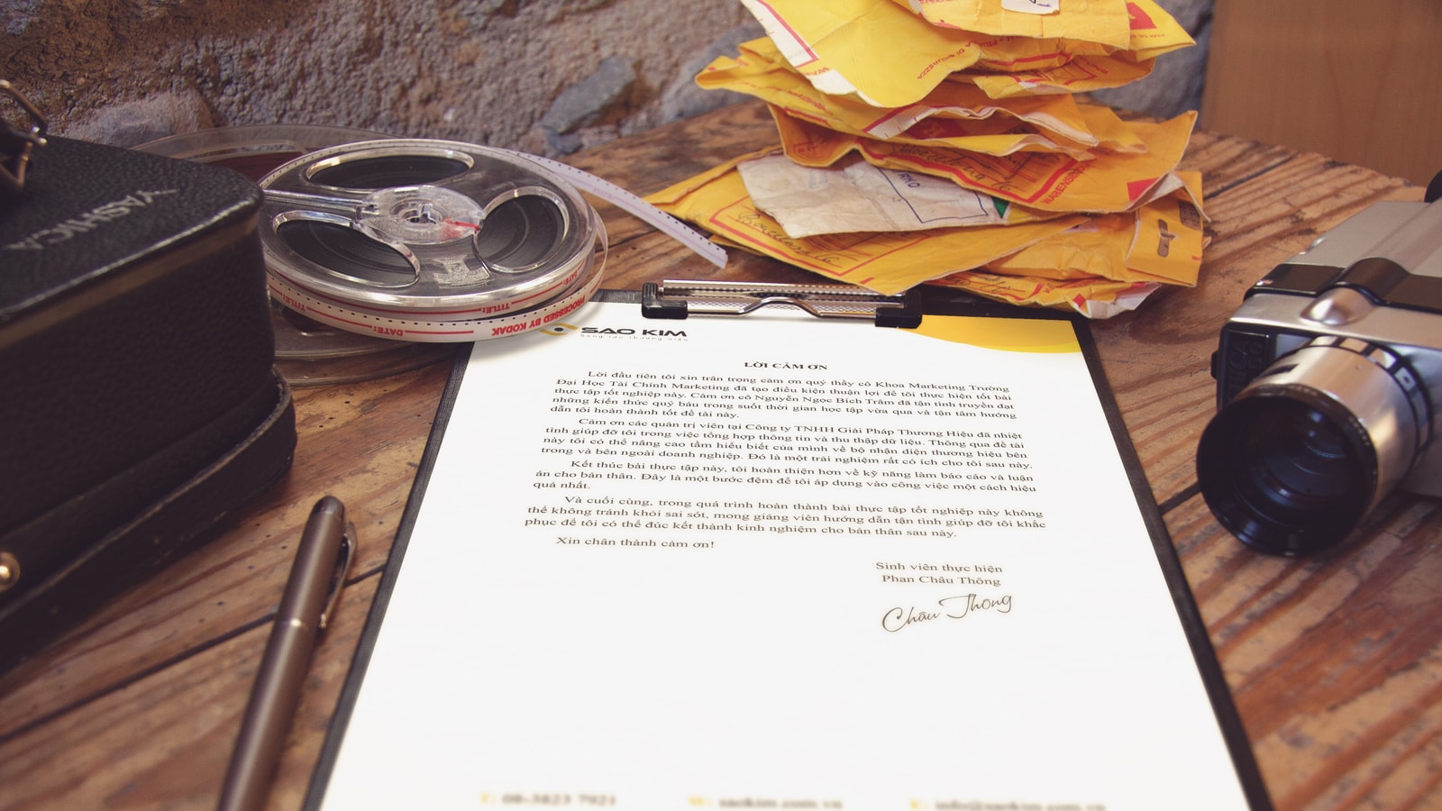 Business tax paperwork and calculator on an office desk